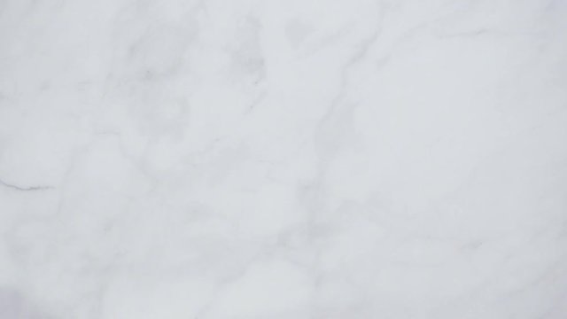 Folding Blck and white patterned paper towels on marble surface