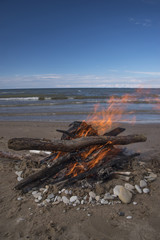 Fototapeta premium A bonfire burns in a camping i
