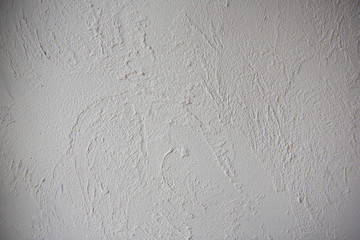 Obraz premium Grey plaster background, cracked and textured leaden cement