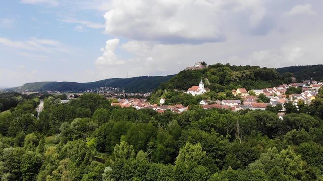 Aerial view of Donaustauf town architecture with ancient Donaustauf Castle on the hill, Bavaria, Germany