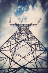 electric pylon on the cloudy sky background