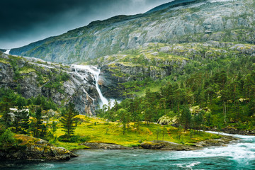 South Fjord, Norway. Giant Waterfall In Valley Of Waterfalls. Husedalen Waterfalls