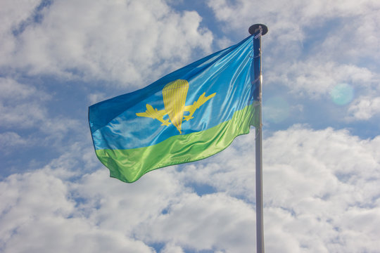 The Flag of the Airborne Forces is developing against the sky. Flag of the Airborne Forces.