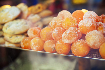 Tasty dried oranges in a showcase