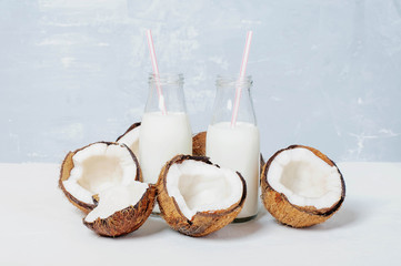 Fresh organic coconut milk in a tube bottle, coconut milkshake,