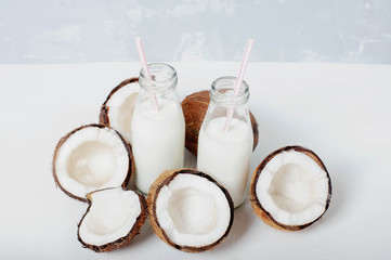 Fresh organic coconut milk in a tube bottle, coconut milkshake,