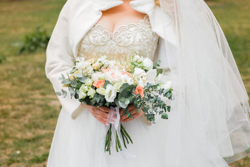 Bride's bouquet on the nature. Wedding day