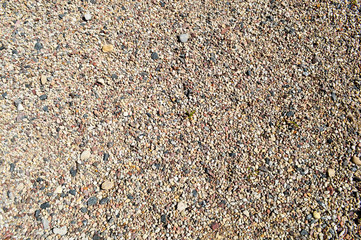 Texture of natural natural carved solid strong rough rough sharp textured mineral gray brown stone cobblestone on the walls of the rock. Stone background