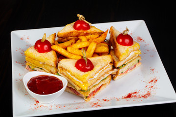 Club sandwich with french potato