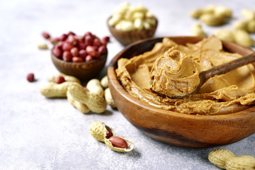 Homemade peanut butter with assortment of nuts.