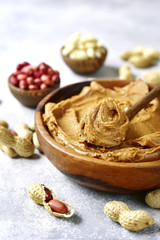 Homemade peanut butter with assortment of nuts.
