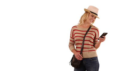 Naklejka premium Portrait of happy blonde female hipster using phone on solid white copy space