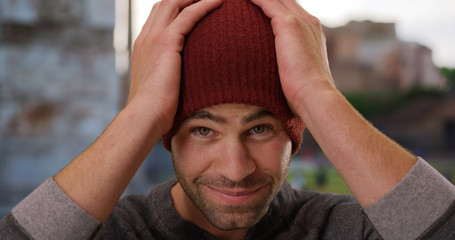 Close up portrait of sexy Caucasian man smiling at camera in Rome
