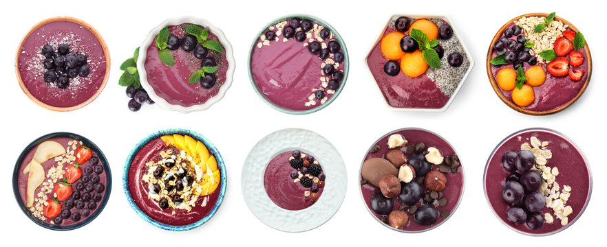 Set with delicious acai smoothie on white background, top view