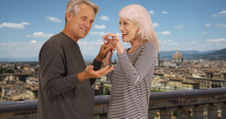 Cheerful mature couple buy a home in Florence