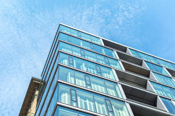 Modern condo buildings with huge windows in Montreal downtown, Canada. 