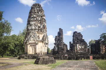 Beautiful Chedi and ancient temple ruins of Wat Si Chum in Sukhothai Historical Park, Thailand.