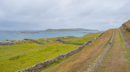 Panorama of the coast of an irish island in the atlantic ocean in summer