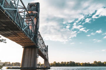 Old Two Lane Vertical Lift Bridge Needing Repairs at Sunset