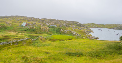Fototapeta na wymiar Panorama of the coast of an irish island in the atlantic ocean in summer
