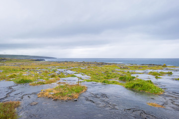 Rocky beach along the atlantic ocean in summer