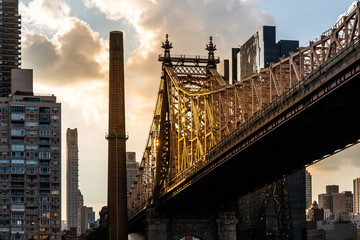 Obraz premium New York City / USA - JUL 27 2018: Queensboro Bridge looking up view in sunny afternoon