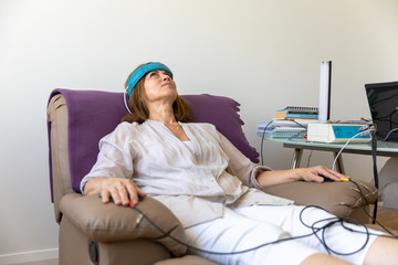 Biofeedback Patient Being Tested by Doctor