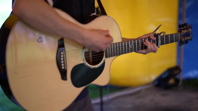 Festival Acoustic Guitar Strumming Slow Motion