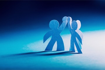 Paper People in a Circle Holding Hands