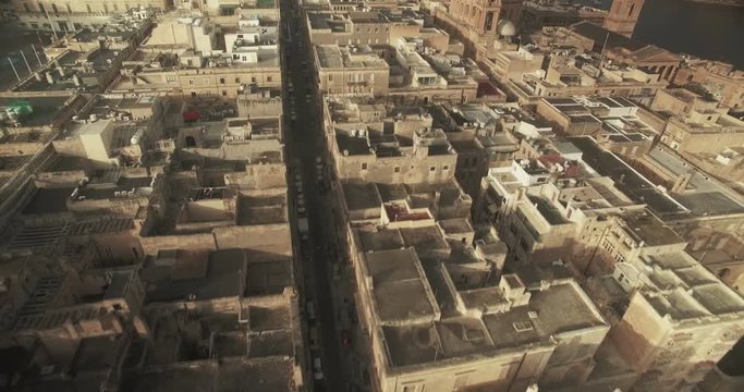 Aerial Shot - Flying backwards over a mediterranean city