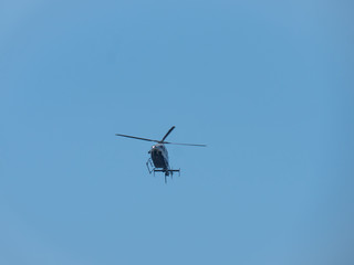 Fototapeta na wymiar Helicopter in the sky