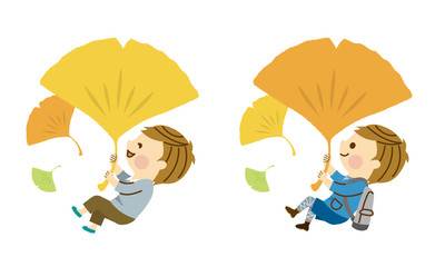 イチョウをつかむ男性