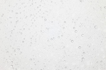 Water drops on glass, Rain droplets on glass background.