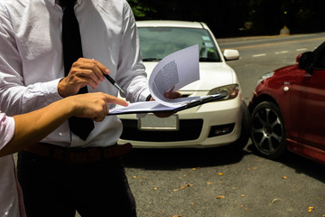 The insurance agent working claim process in payment on from parties .Insurance claim concept .
