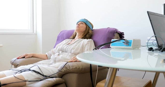 Biofeedback Patient Being Tested by Doctor