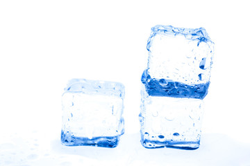 Blue ice cubes on white background.