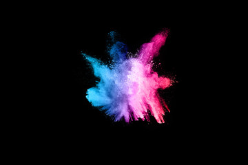 abstract colored dust explosion on a black background.abstract powder splatted background,Freeze motion of color powder exploding/throwing color powder, multicolored glitter texture.