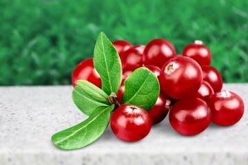 Red cranberries isolated on background