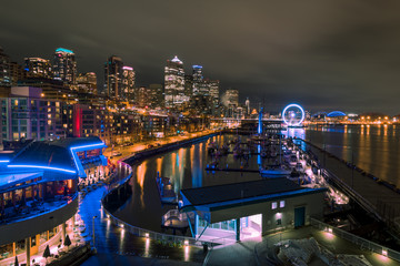 Seattle skyline, waterfront and Great Wheel across Bell Harbor Marina, WA, USA