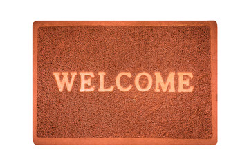 Welcome mat in front of door.