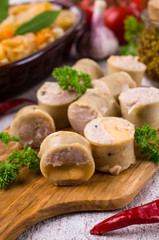 Slices of natural sausages with cheese