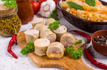 Slices of natural sausages with cheese