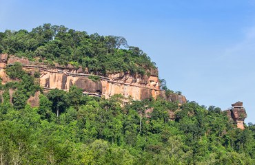 View of wat Phuthok or wat Jatiyakeeree viharn on cliff  high mountain with blu sky at Bueng Kan Province, Thailand     