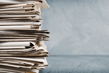 File folders with documents on white table