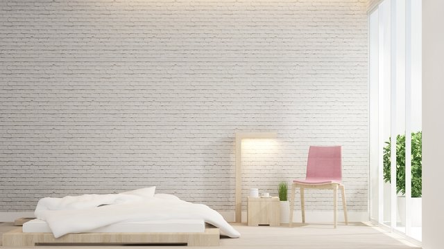 Bedroom and pink chair on living area design room for artwork. White bedroom and living area on white brick wall decorate and empty space for add message artwork. 3D Rendering.