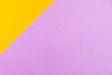Pastel colored paper flat lay top view, background texture, pink, purple, yellow, orange