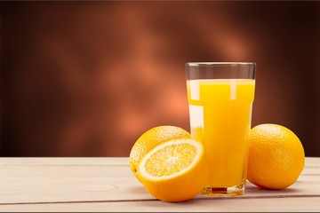 Orange juice and slices of orange on
