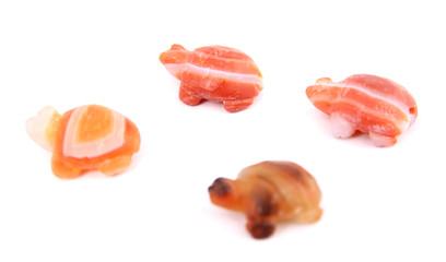 Gems and stones against a white backdrop.