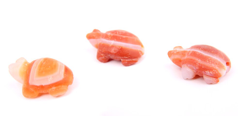 Gems and stones against a white backdrop.