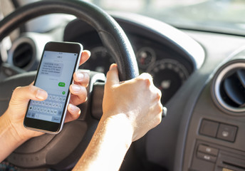 Texting while driving on smartphone